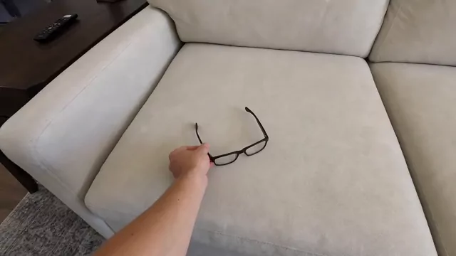 Glasses left on the sofa cushion